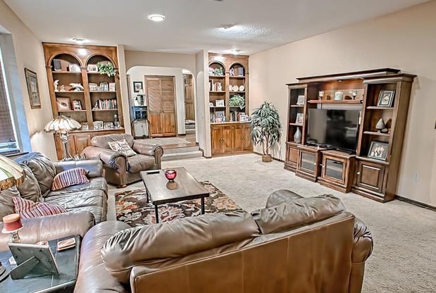 living room in lakefront neighborhood home for sale in leesburg, fl.jpg