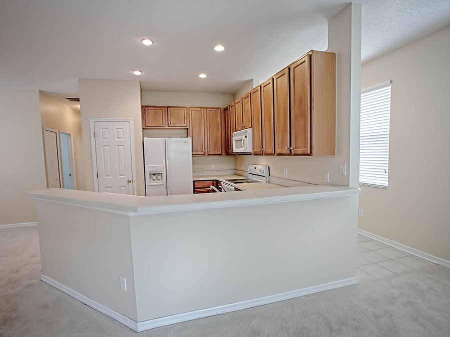 kitchen_on_open_floor_plan_real_estate_home_for_sale_mount_dora_florida.jpg