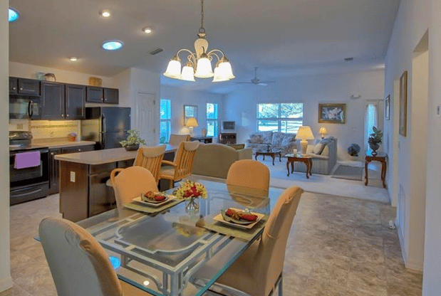 kitchen and living room inside the villages, florida home for sale.png