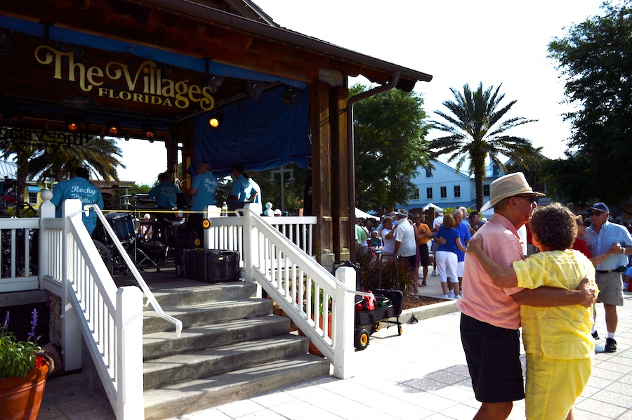 villages dancing by gazebo