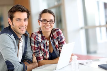 bigstock-Young-people-working-on-laptop-53532142